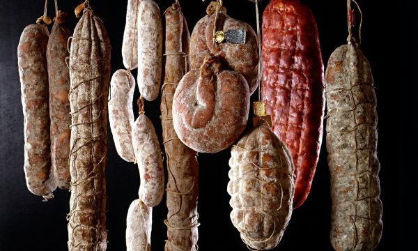 Row of hanging salamis